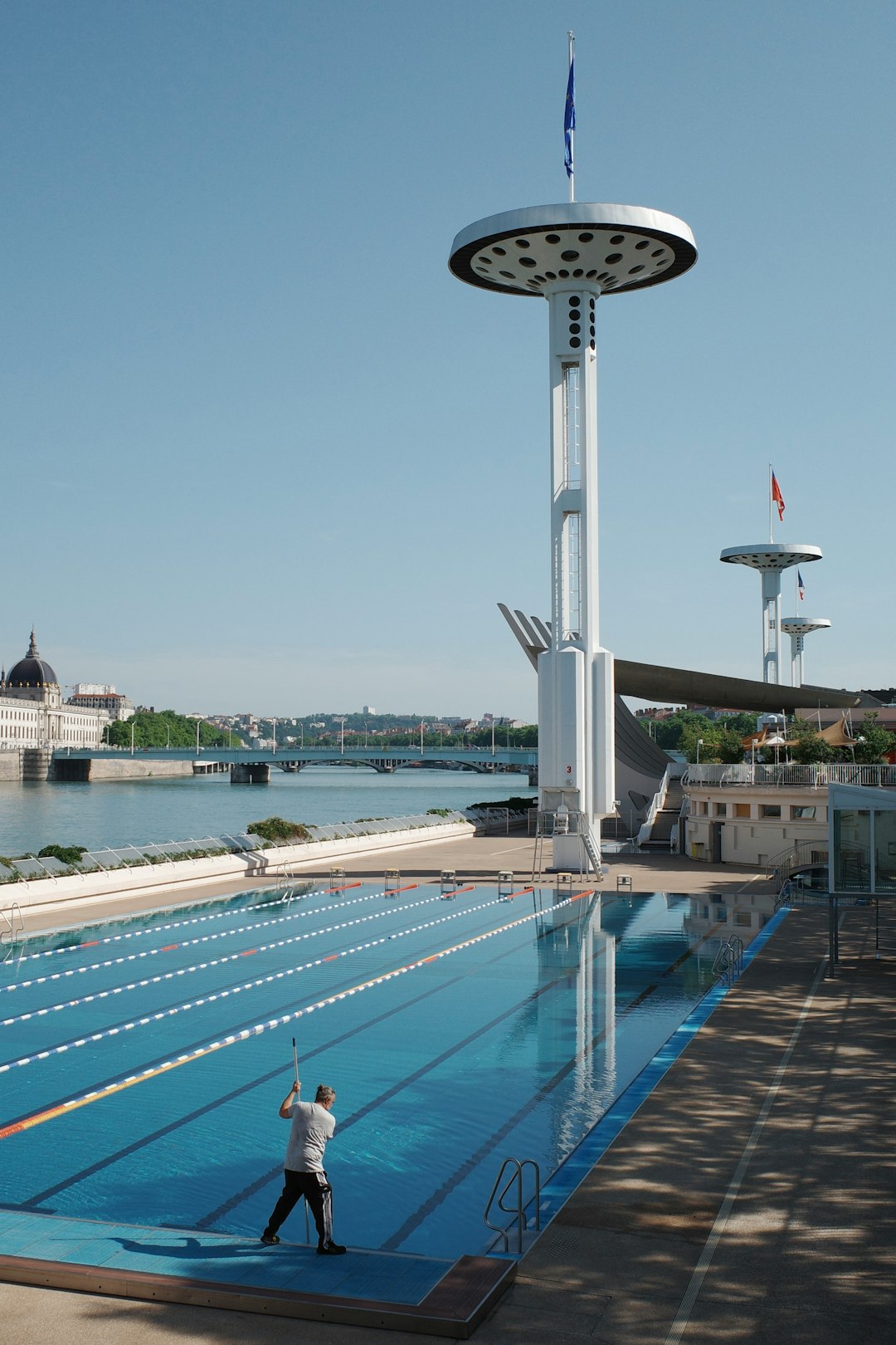 The Art of Drawing Readers In: Your attractive post title goes here man-cleaning-an-empty-swimming-pool-near-a-river-fbhizpsf4uq